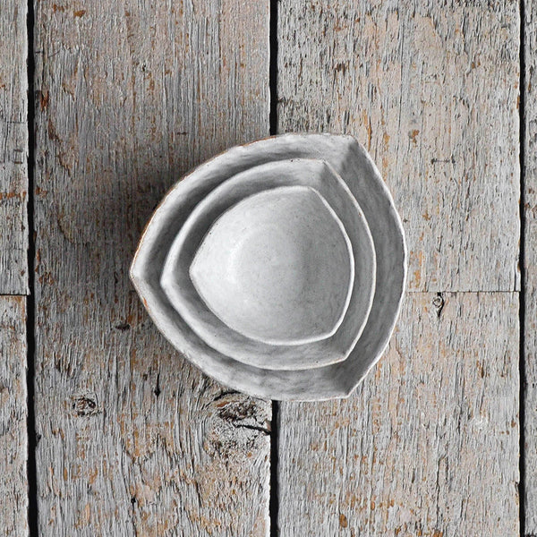 Set of three Large Snow White ceramic snack bowl with a hand-moulded organic shape, designed as a minimalist serving piece for chips, crackers, and shared appetizers