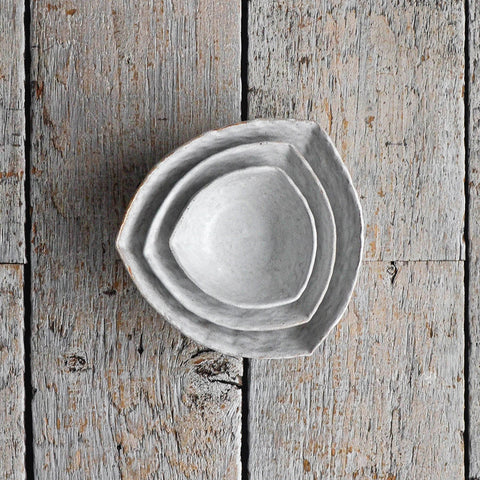 Set of three Large Snow White ceramic snack bowl with a hand-moulded organic shape, designed as a minimalist serving piece for chips, crackers, and shared appetizers