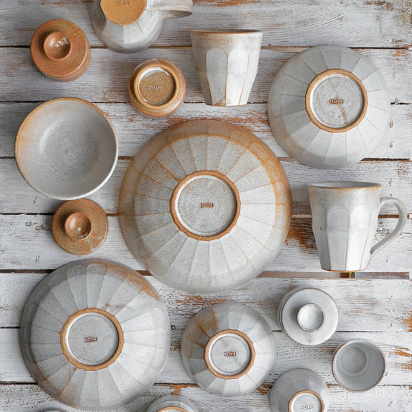 https://nomliving.com/cdn/shop/products/Nom-Living-Stoneware-Facet-Launch-Flatlay-Feb-2021-WEB_grande.jpg?v=1612616977